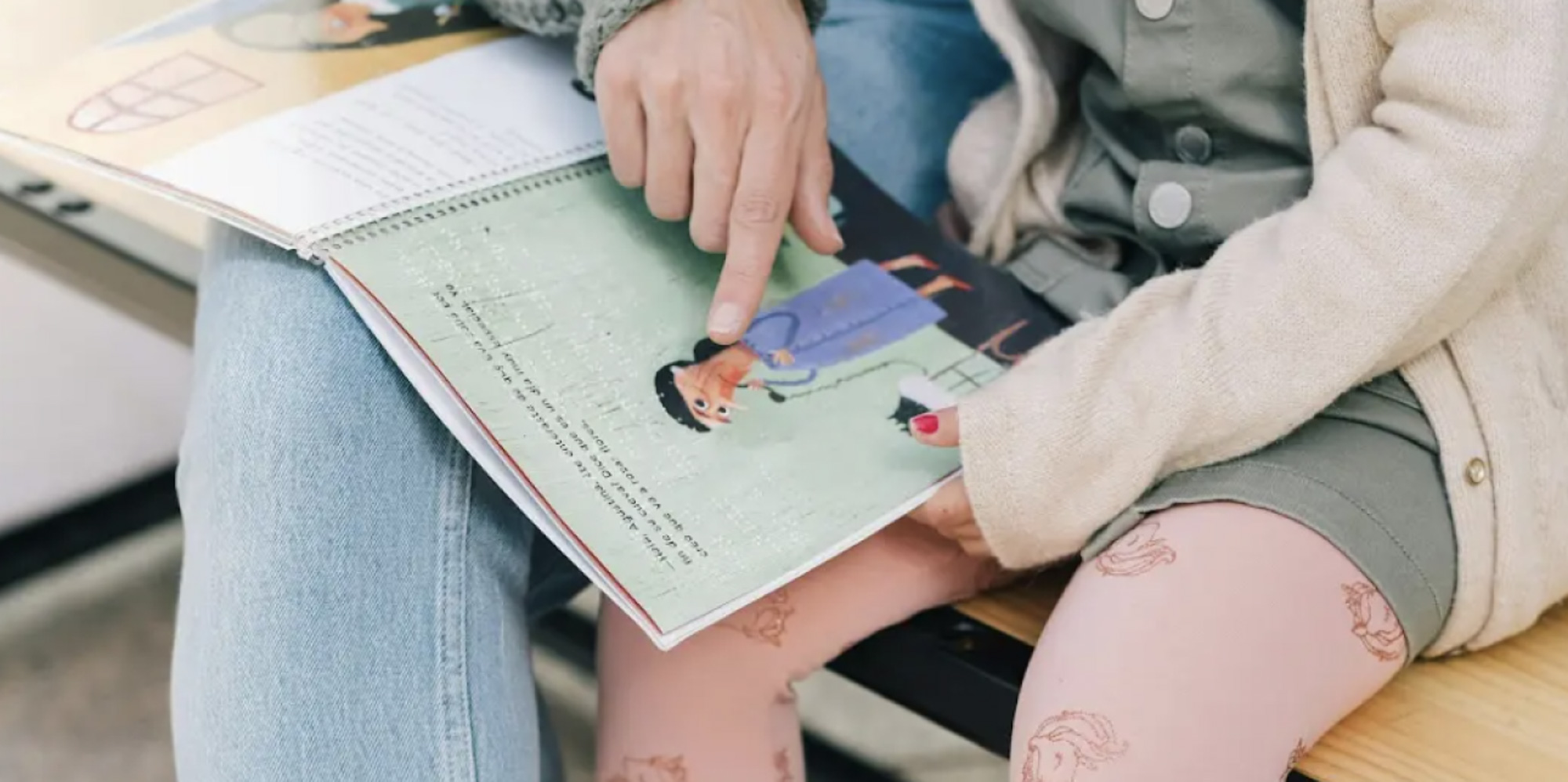 Group of students laughing at teacher.